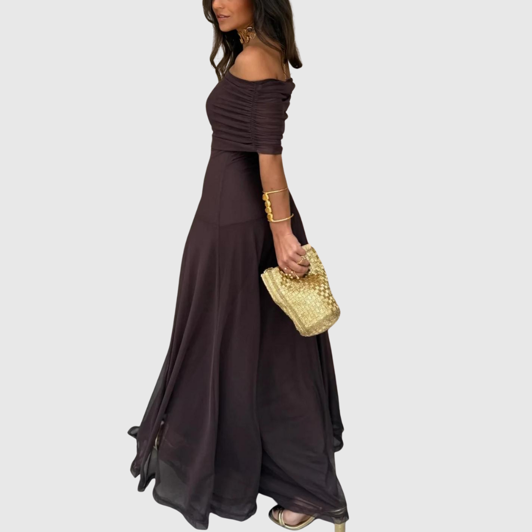 Eleva il tuo stile con l'abito lungo in chiffon con spalle scoperte Lorenzo. Leggero, fluido ed elegante per ogni occasione. Acquista ora!