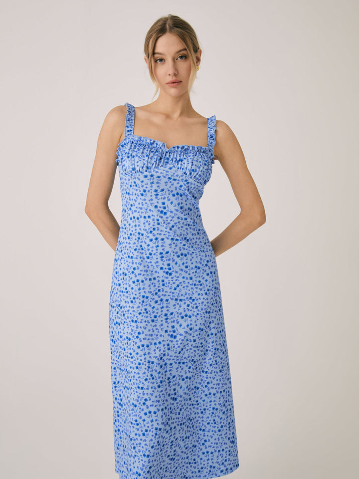 Elegante abito midi bohemien con spalline e stampa floreal