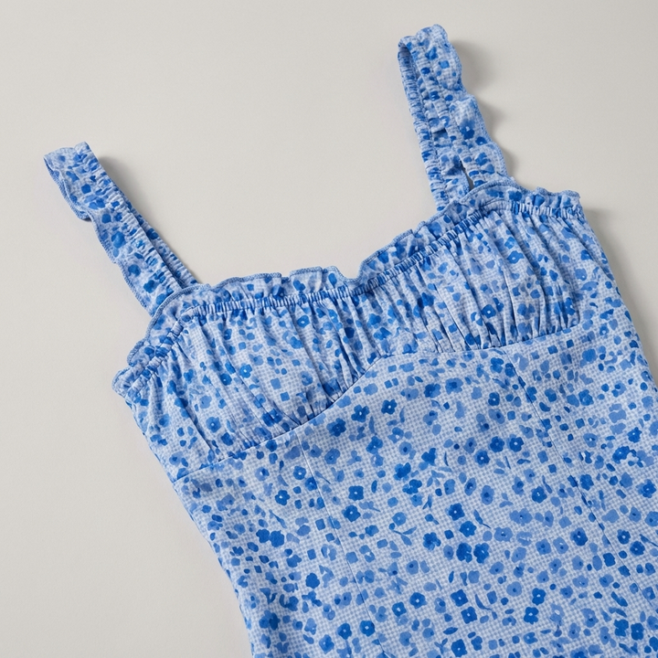 Elegante abito midi bohemien con spalline e stampa floreal