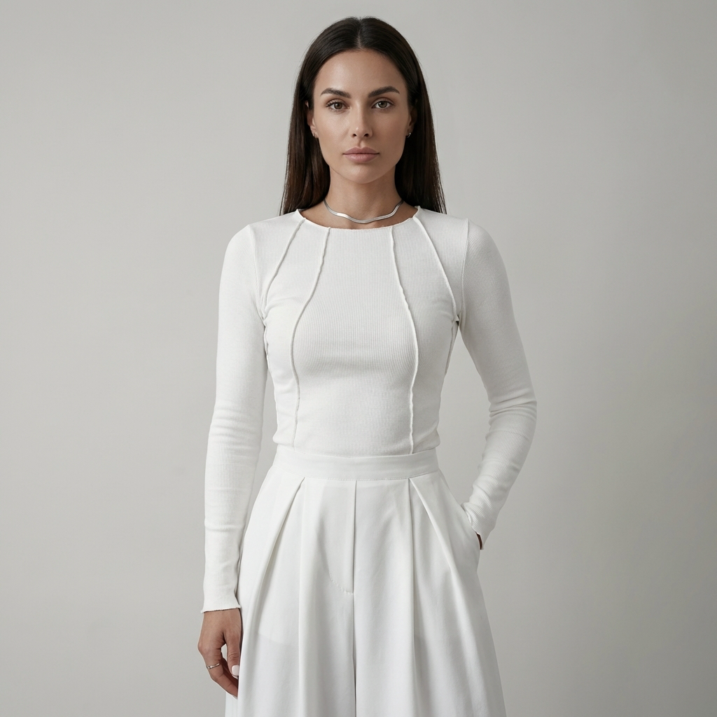 Top elegante a maniche lunghe con bordino