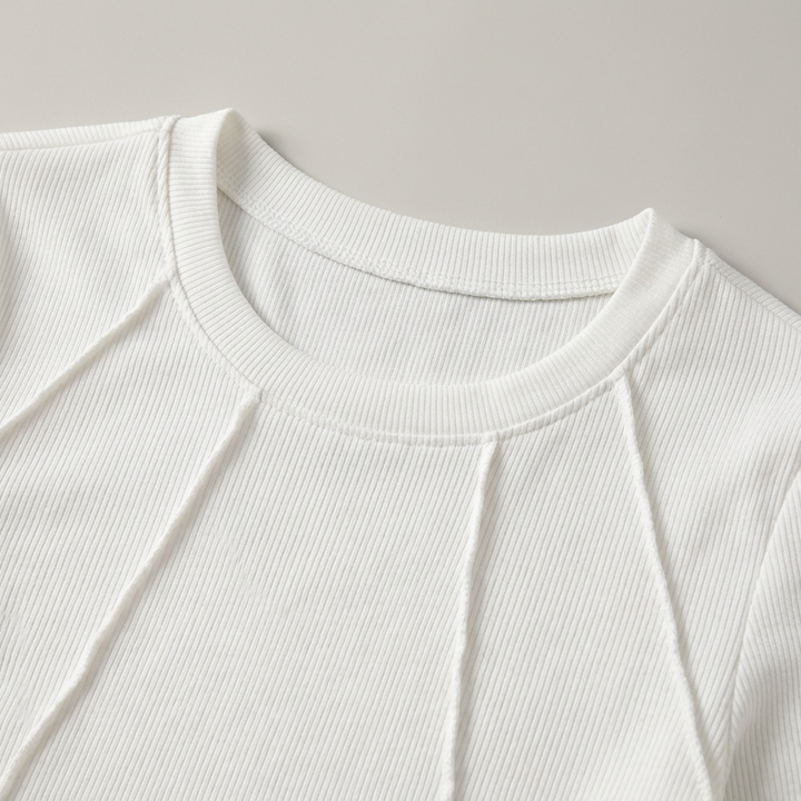 Top elegante a maniche lunghe con bordino